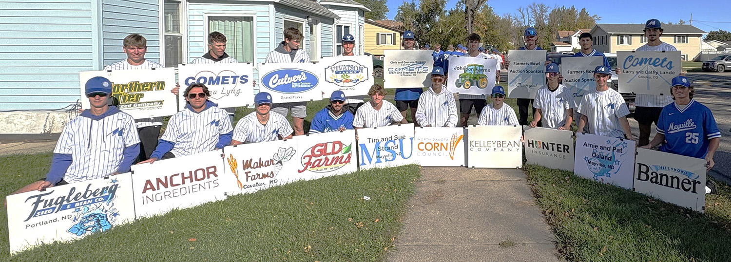 Basball team with auction signage Sept 27, 2025 1.jpg