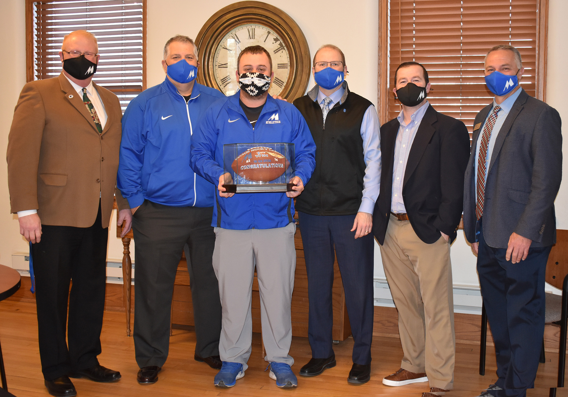 Coach Larson presented with commemorative football :: Mayville State  University :: Mayville, ND